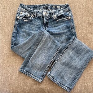 Miss Me Mid Rise Easy Boot Jeans in Faded Blue Denim